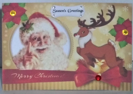 Santa with reindeer  with bow and poinsettias A5 by Hazel Underwood