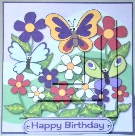 Flowers and Funny Butterflies LEONIE 65th topper  by Hazel Underwood