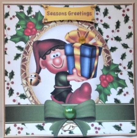 Santas Elf the helper in holly frame 7x7 by Hazel Underwood