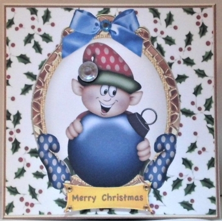  elf holding blue bauble in holly frame with bow 7x7 by Hazel Underwood
