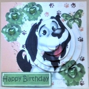 Cute puppy with green flowers circle pyramids by Hazel Underwood