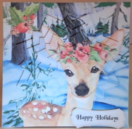 Lovely reindeer in the snow, with snowflake pyramids by Hazel Underwood