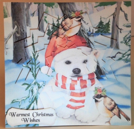 Lovely polar bear with robins in the snow, with snowflake pyramids by Hazel Underwood