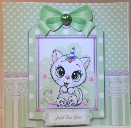 White kitty with party hat on a tag , green stripes and bow 7x7 by Hazel Underwood