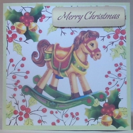 Lovely Rocking Horse with holly& bells in 7x7 festive frame by Hazel Underwood
