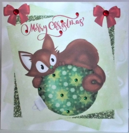 Cheeky Kitty on a christmas bauble with red bows 8x8 by Hazel Underwood