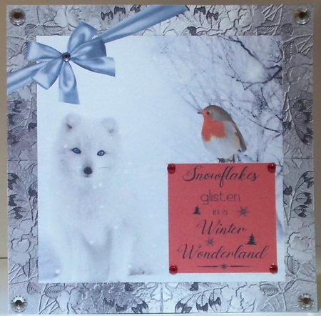 Christmas Robin and white wolf by Hazel Underwood