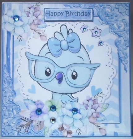 Little blue bird with flowers in ornate 8x8 frame by Hazel Underwood
