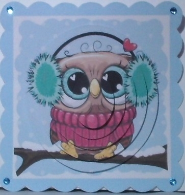 Cute owl on a branch with snow, oval pyramids by Hazel Underwood