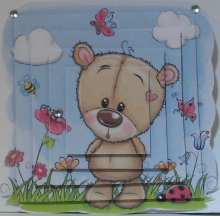 Cute teddy in flower garden square pyramids by Hazel Underwood