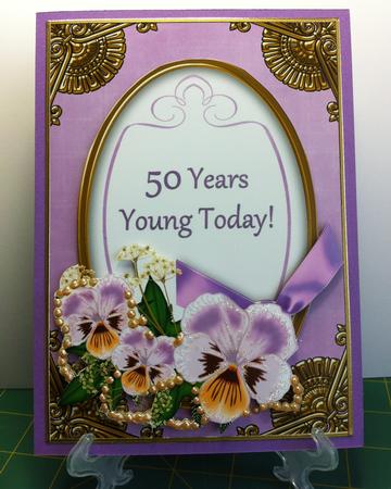 Lilac Pansies 50 Years Young Oval 7x5in Step by Step by Helanna Hancock