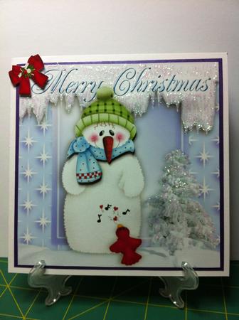 Cheery Snowman with Little Robin and Bows by Helanna Hancock