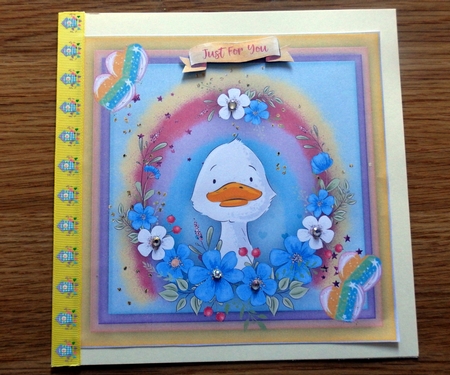 Duck in a Flower Fame by Helen Gomm