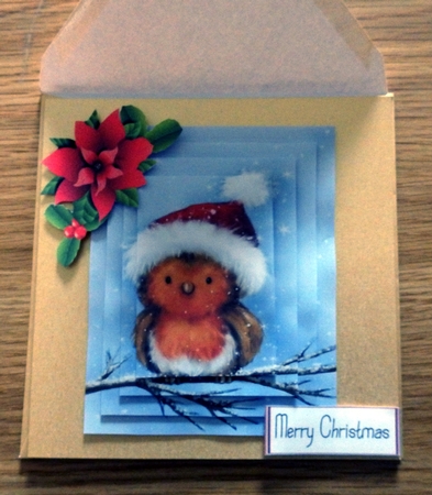Pretty robin on a branch pyramids by Helen Gomm