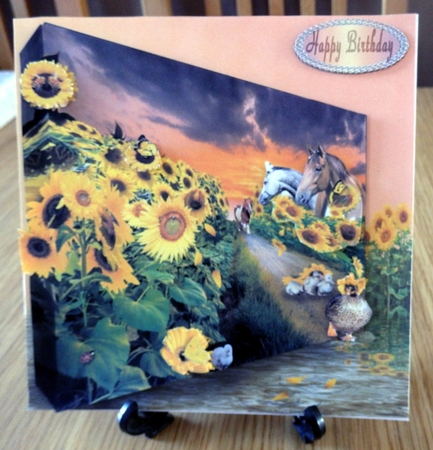 through the sunflowers by Helen Gomm