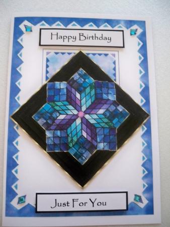 Stained Glass Pyramid on Black Background by Helen Gomm