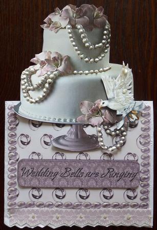 Wedding Bells Are Ringing Over the Edge Card with Cake by Helen Gomm
