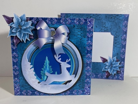 Christmas Bauble - An illusion paper cut card.  by Helen Howell