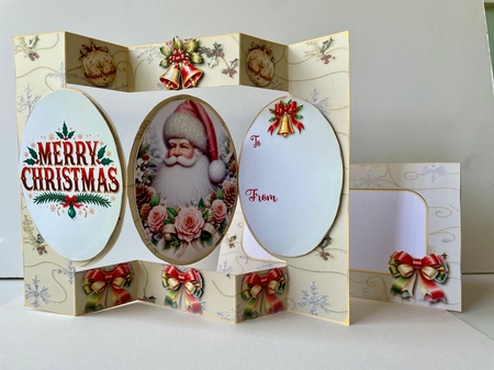 Merry Christmas Oval Pop Out Card by Helen Howell