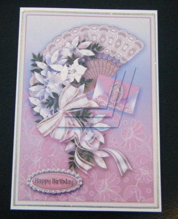 Ivory Floral Spray on a Fan Pentagon Pyramage by Charlie Angel