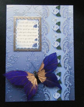 Periwinkle Floral Spray Embossed with Floral Border by Charlie Angel
