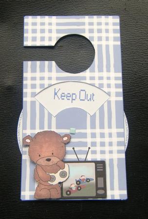 Boys with Toys Spinnin' Door Hanger by Charlie Angel