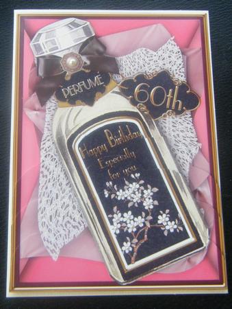 Black 60th Perfume Bottle 7x5in Scallop Bottom Stacker by Charlie Angel