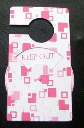 The Gallery of Squares Spinnin' Door Hanger by Charlie Angel