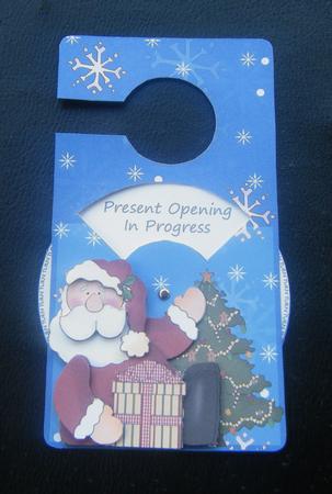 Santa Please Stop Here Male Spinnin' Door Hanger by Charlie Angel