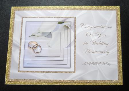 Wedding Rings & Lilies - 1st Anniversary by Charlie Angel