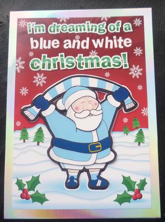 Father Christmas Blue & White Football Fan by Charlie Angel
