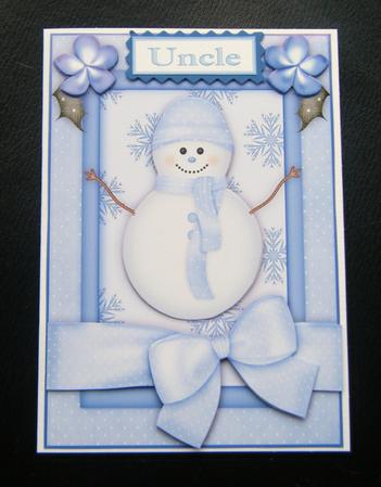 Christmas Snowman A4 Card Front in Blue by Charlie Angel