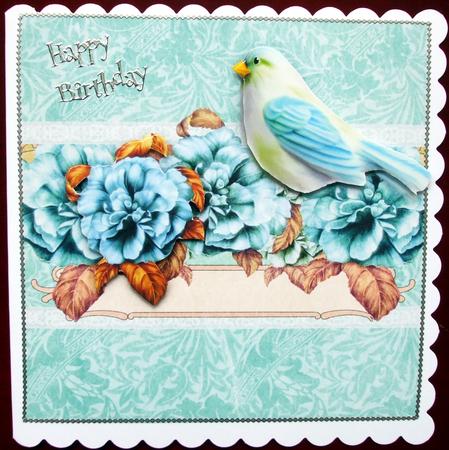 Enchanted with Blue Bird in Flower Frame with Butterflies by Hilary Shemmans