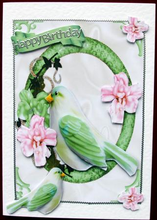 Pretty Green Bird in Ring of Flowers by Hilary Shemmans