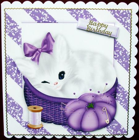 So Cute! Little White Kitten Sleeping in a Basket by Hilary Shemmans