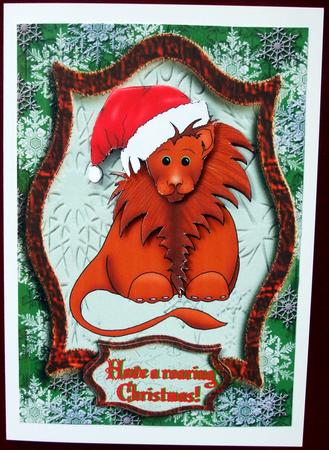 Roaring Christmas Lion with Gift Tag by Hilary Shemmans
