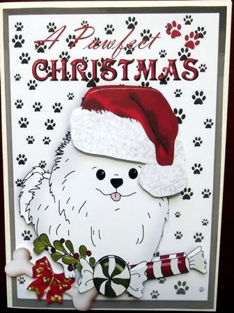 A Pawfect Christmas Cute Pomy Puppy in Santa Hat by Hilary Shemmans