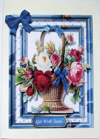 Beautiful Basket of Mixed Roses in a Blue Frame by Hilary Shemmans
