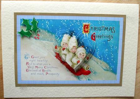 Sledging at Christmas decoupage topper by Hilary Shemmans