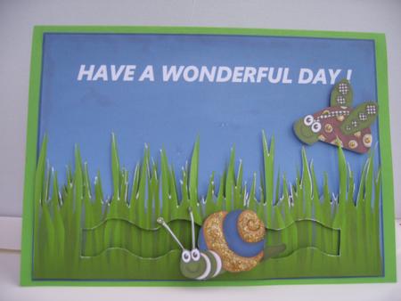 Bugs in the Grass- Wavy Peny Slider by Hilda Mullinger