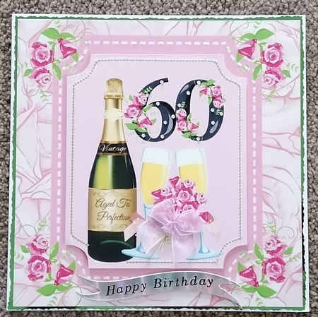 Age 60 rose and champagne card front by Honorscard Appleby