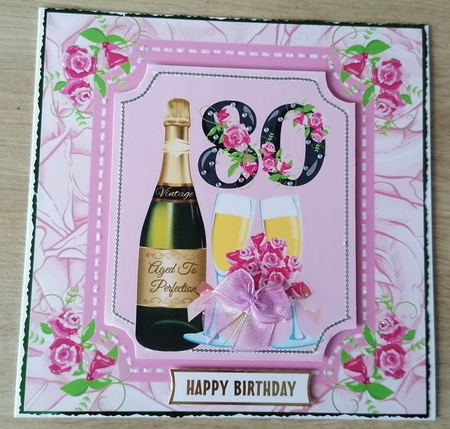 Age 80 rose and champagne card front by Honorscard Appleby