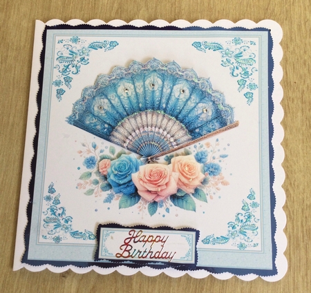 8 x 8 blue floral fan quick card front. by Honorscard Appleby