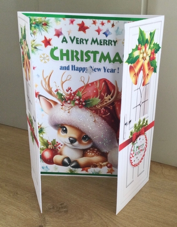 White Gate Fold WIth Red Bows & Bells Sweet Deer In Santa Hat by Honorscard Appleby