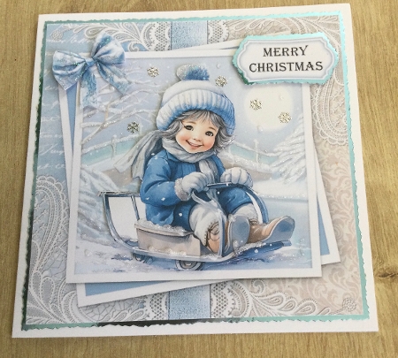 Christmas toboggan  by Honorscard Appleby