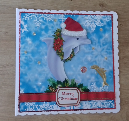 Santa Dolphin with Wreath Topper by Honorscard Appleby