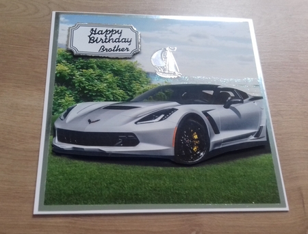 Silver sports car by Honorscard Appleby
