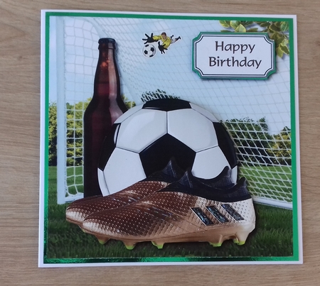Football, net, ball and beer by Honorscard Appleby