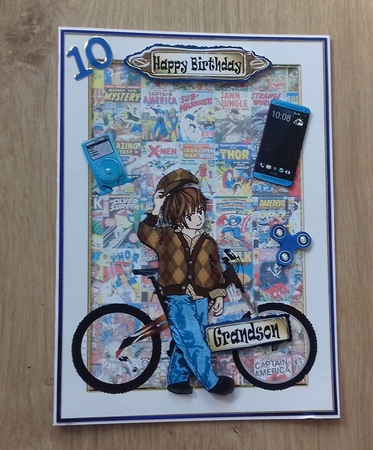 Teenage boy 3 with bike and marvel comics by Honorscard Appleby