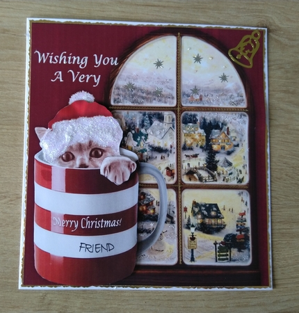 Grey Christmas Cat In A Mug by Honorscard Appleby